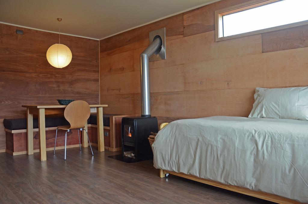 Palafito Azul Apart Hotel Кастро Номер фото